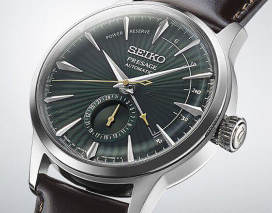 Seiko Presage Cocktail Time watch with emerald green sunburst dial, power reserve indicator and leather strap